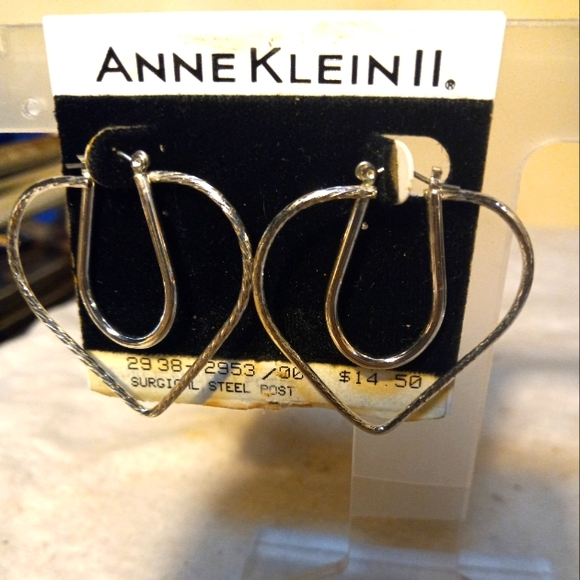 Not new,never worn silver heart shaped pierced earrings by Anne Klein ll. - Picture 1 of 2